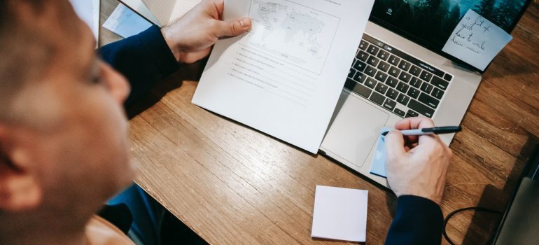 A person holding documents