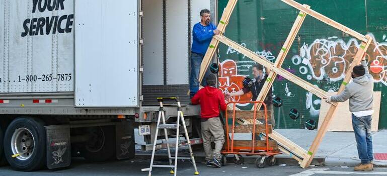 people loading the moving truck