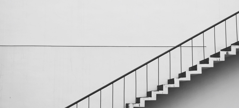 A set of long stairs as one of the most demanding obstacles for moving crews 