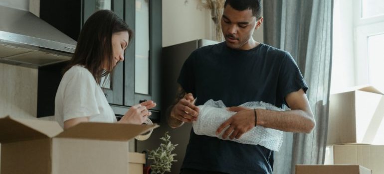 A family packing boxes