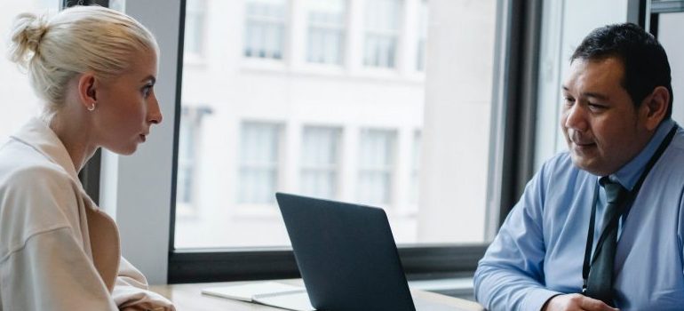 two people in the office, interview