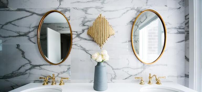 two mirrors on the wall