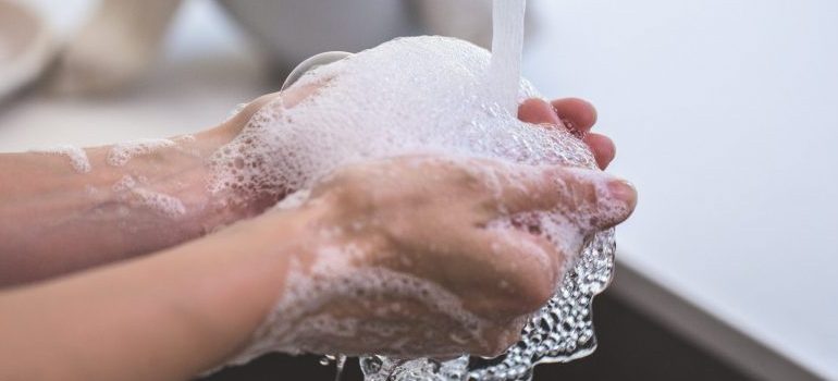 person washing hands