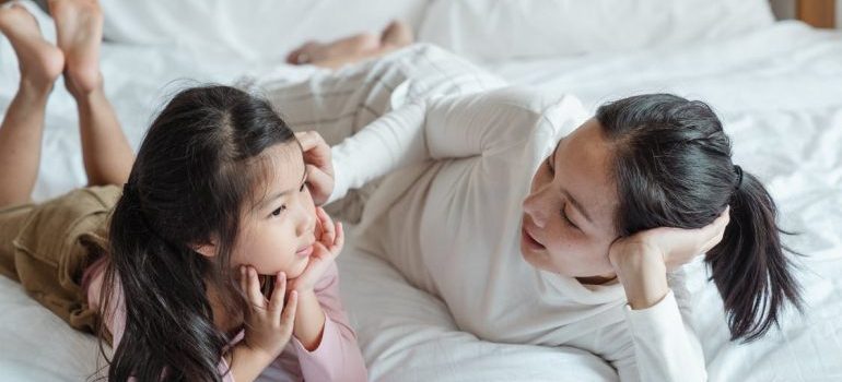 mom helping kids settle into a new home