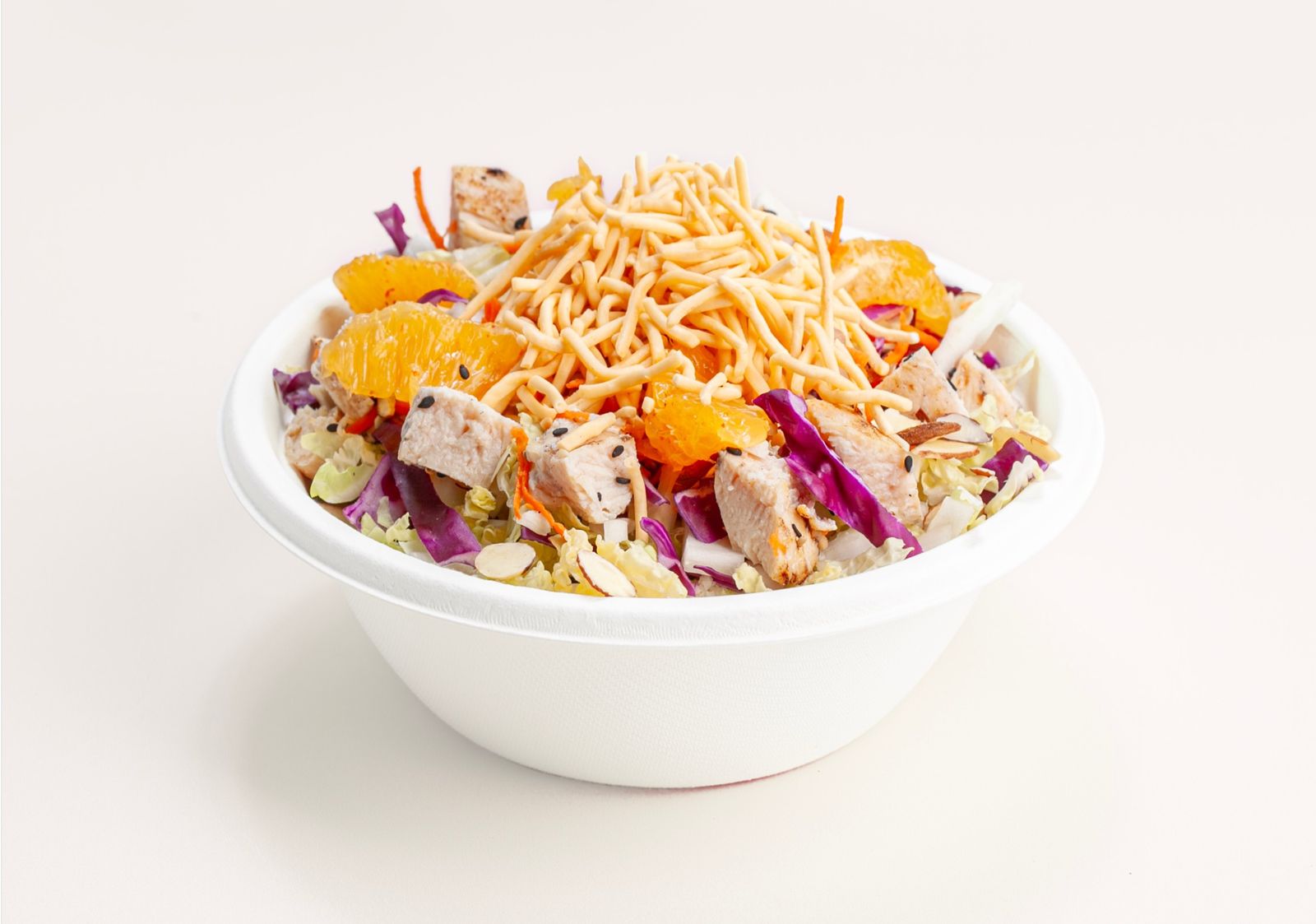 Sesame Crunch Chicken Salad with grilled chicken fresh vegetables and crunchy toppings