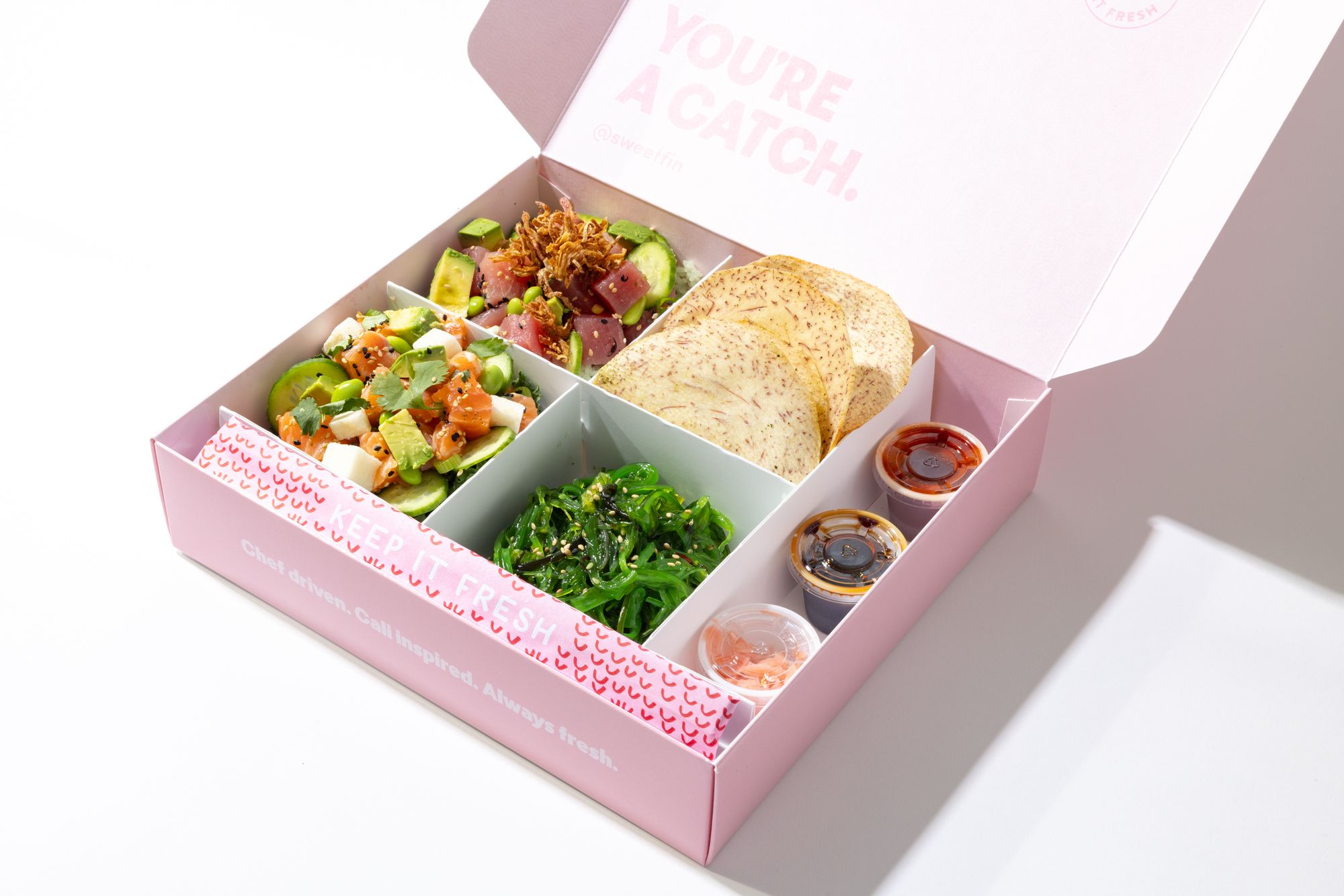 Sweetbox includes Yuzu Salmon Poke, Spicy Tuna Poke, Seaweed Salad, and Taro Chips.