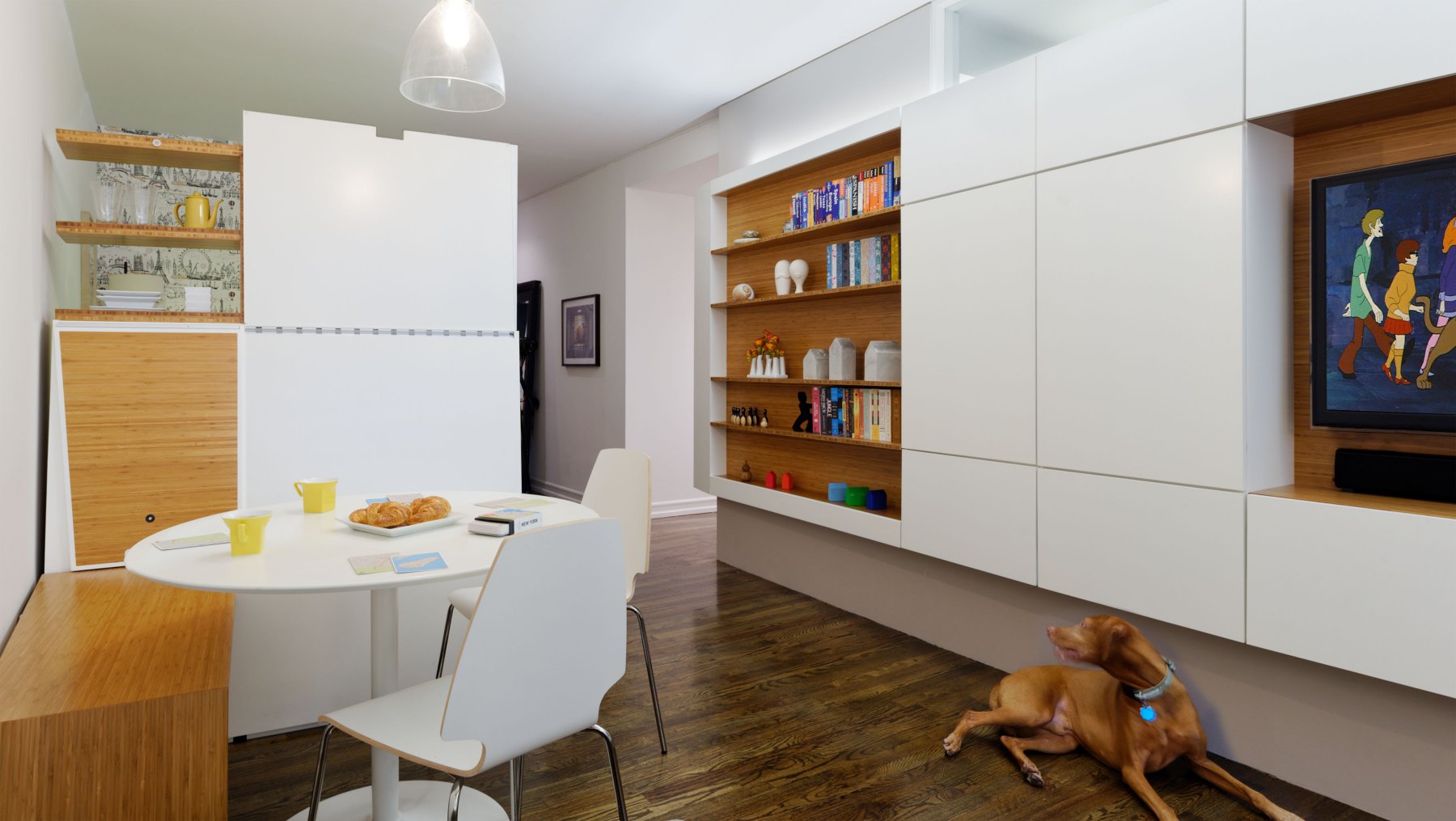 Operable flaps on the panelized exterior of the 'Cloud‑Catcher' vary levels of privacy and light