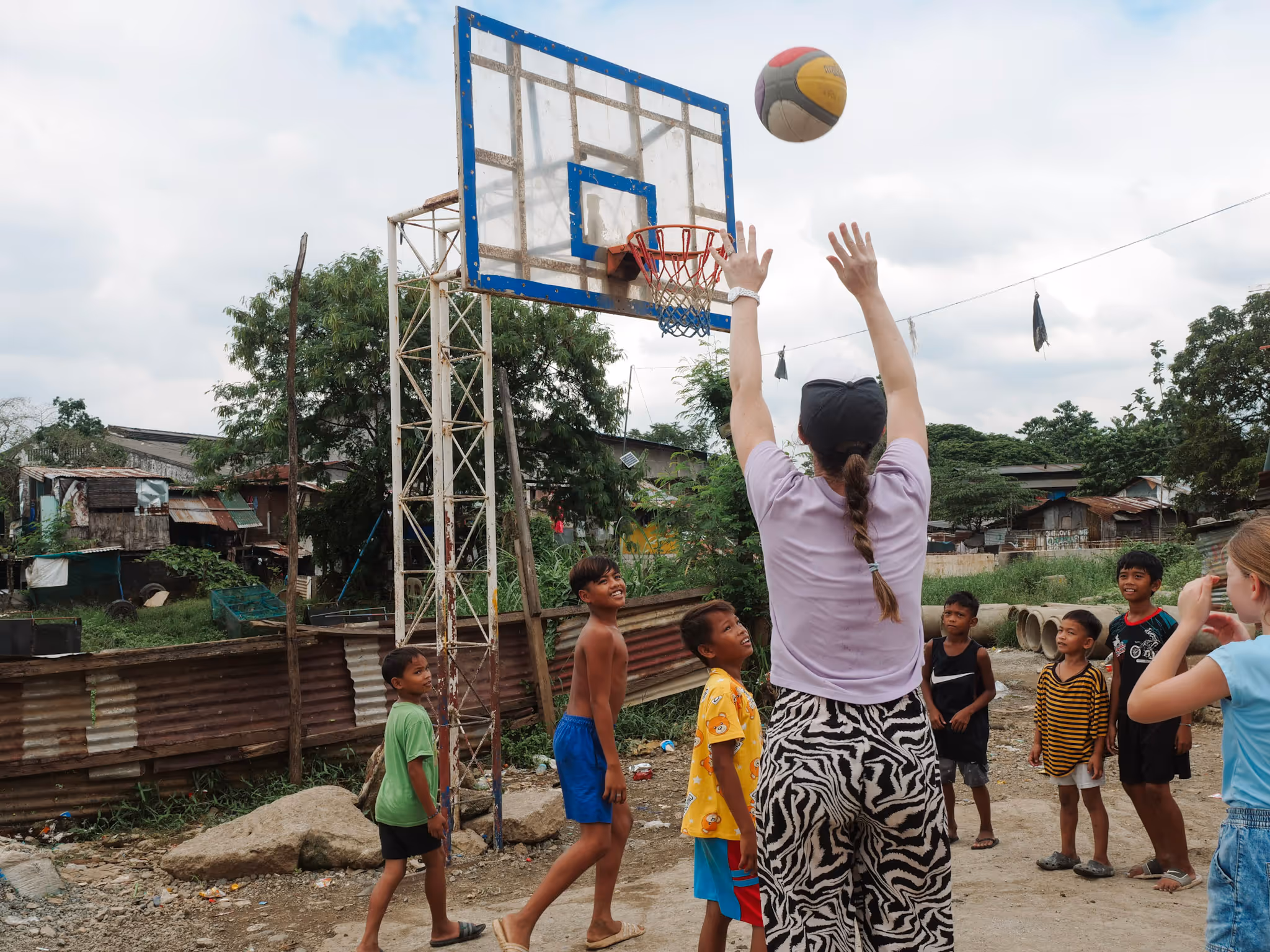 Feedings are not all about food.... they are about relationships. What better way to break the ice than a little basketball!