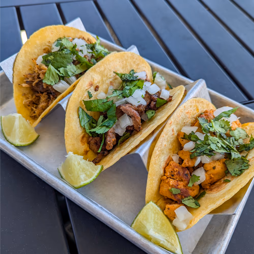 Trio of street tacos served on Taco Tuesdays