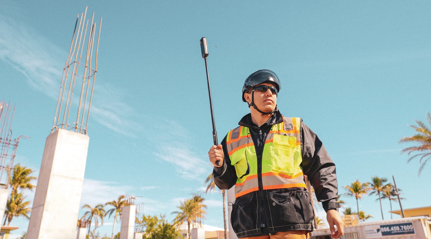 Person walking the jobsite with a 360 camera 