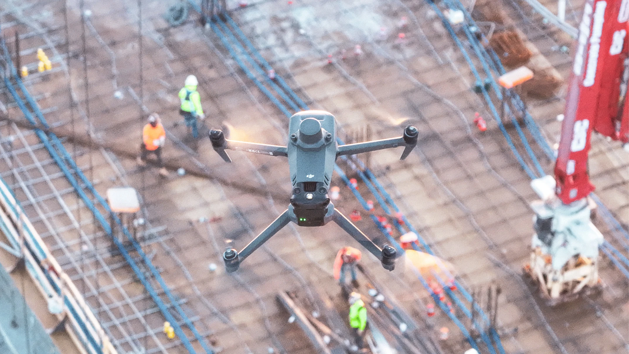 drone in the air over a jobsite