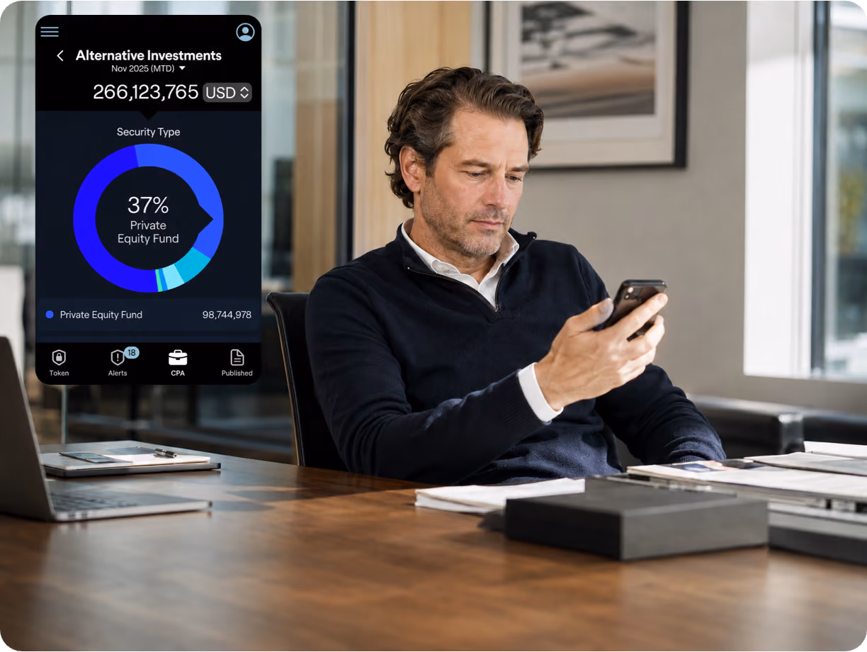 Smiling man in a navy sweater with crossed arms looking at a computer screen displaying a CPA consolidated portfolio analysis with market values and pie charts.