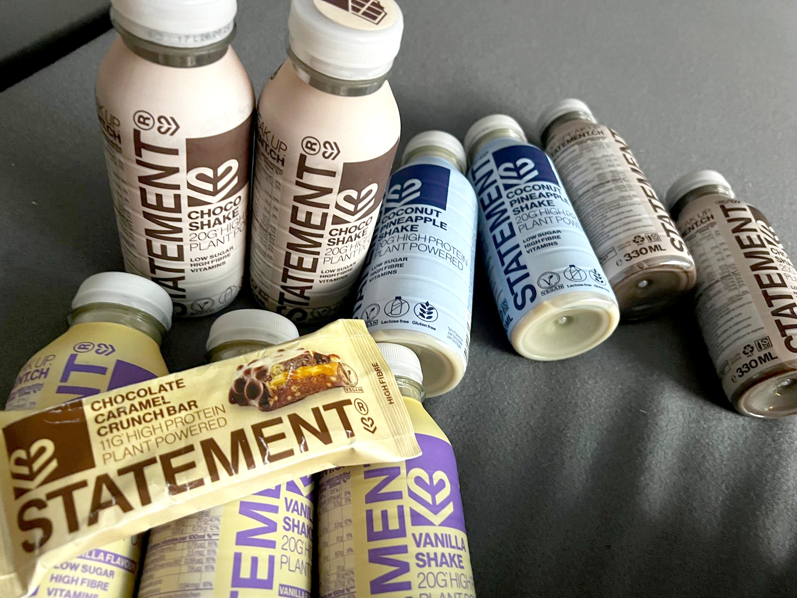 STATEMENT Protein Drinks und Riegel in verschiedenen Sorten