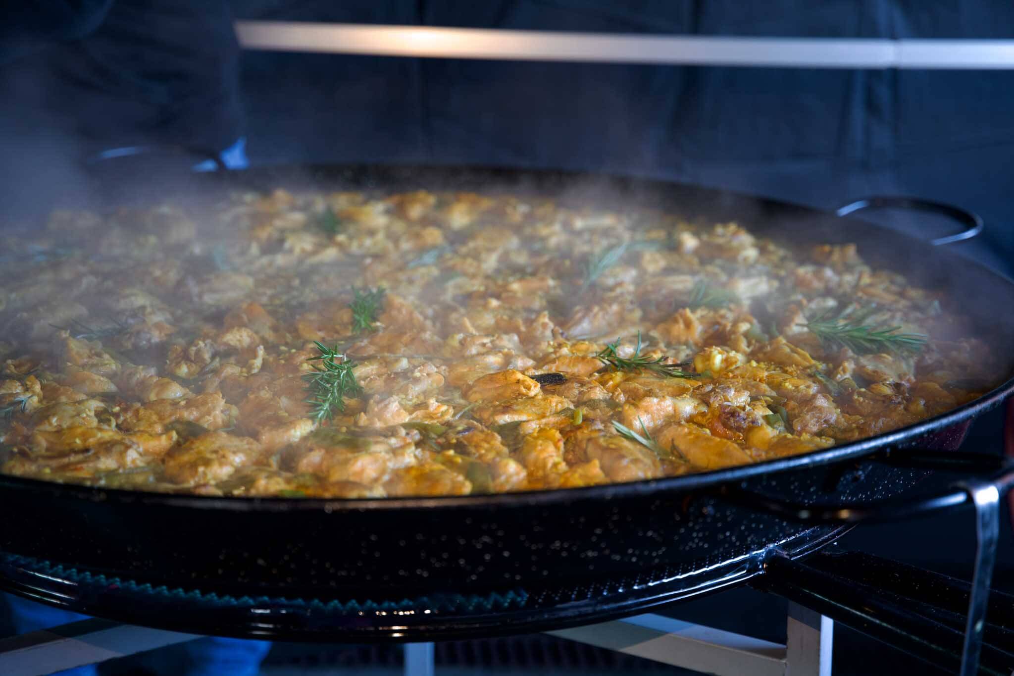 Chicken paella cooking in the pan