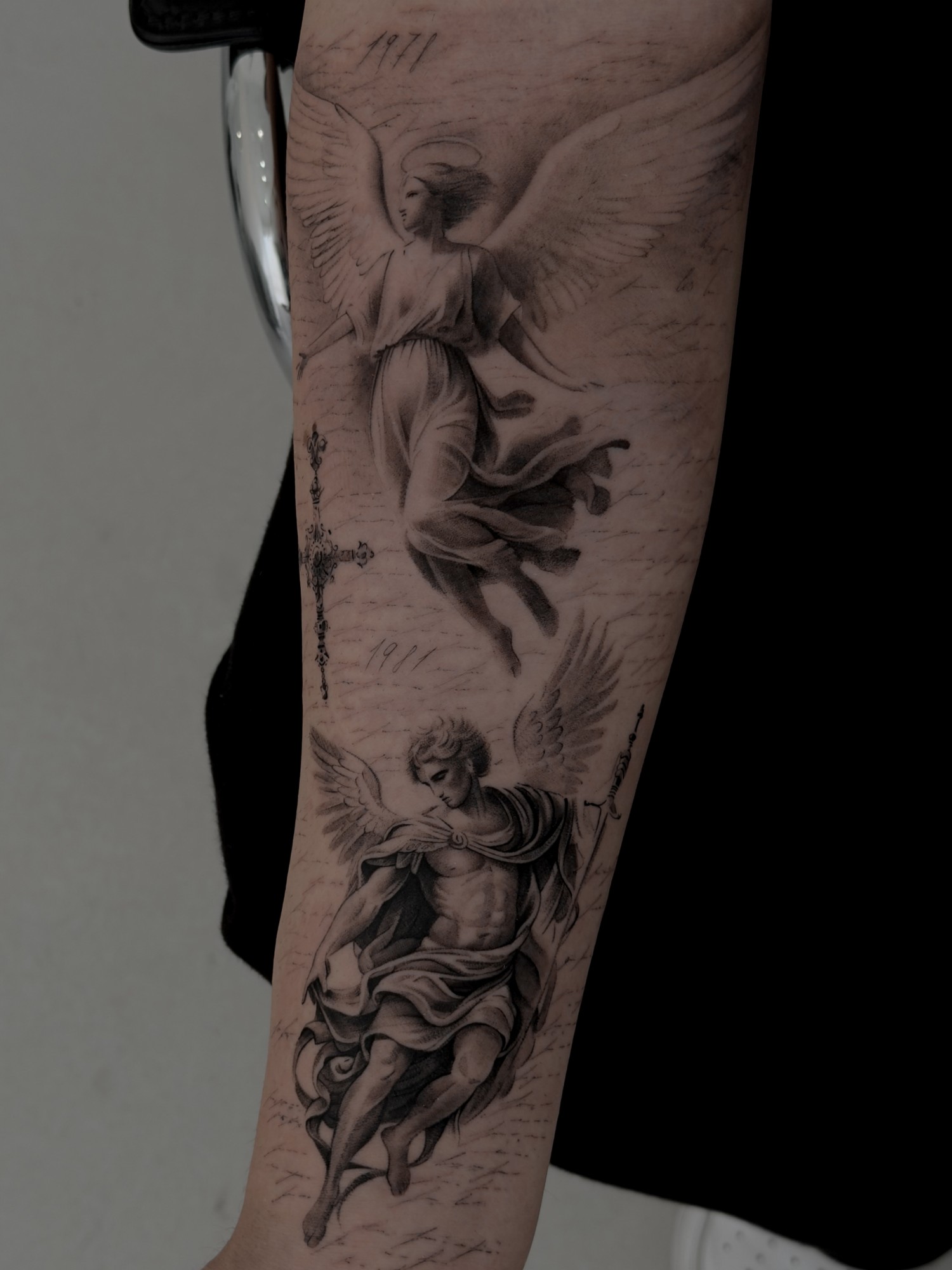 Black and grey angel tattoo