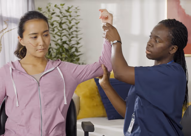 Trained HHA having a conversation with a client