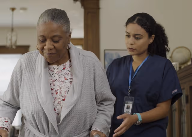 Trained CNA helping a client