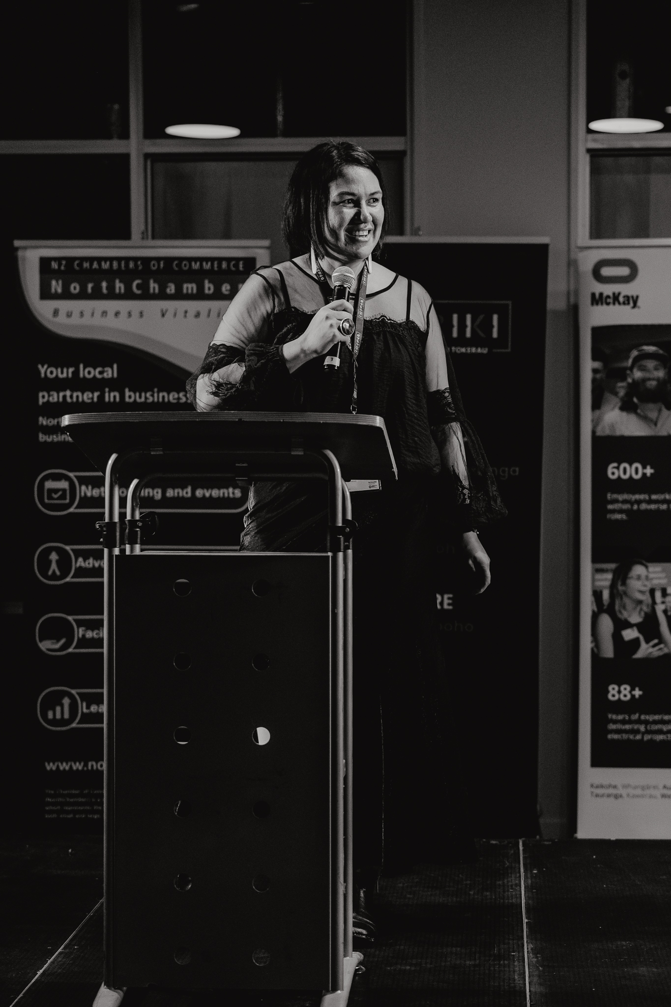 May be a black-and-white image of 3 people, turnstile, parking meter and text