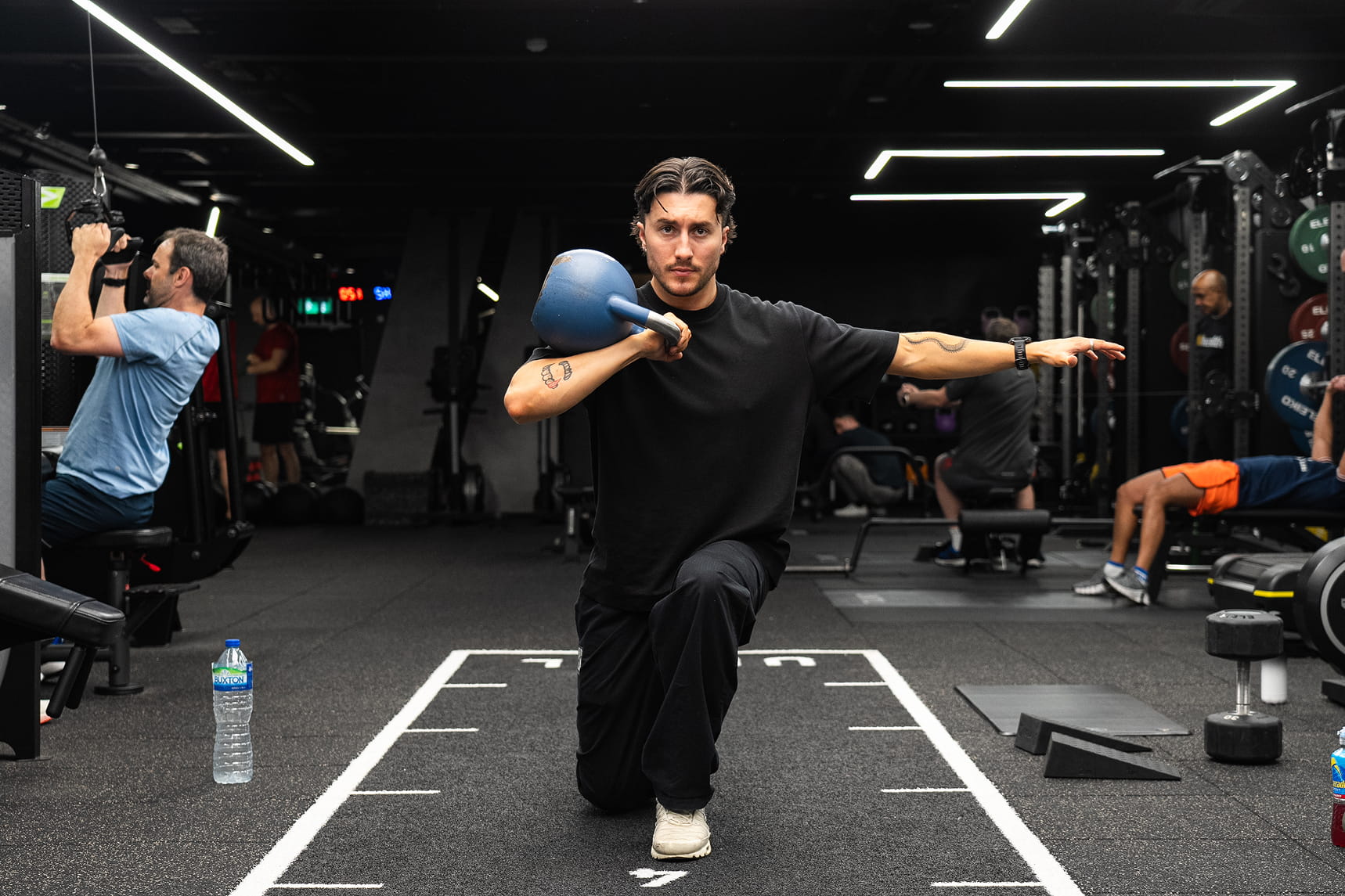 Dan Houchen, rehabilitation exercise specialist, training a client at UNTIL