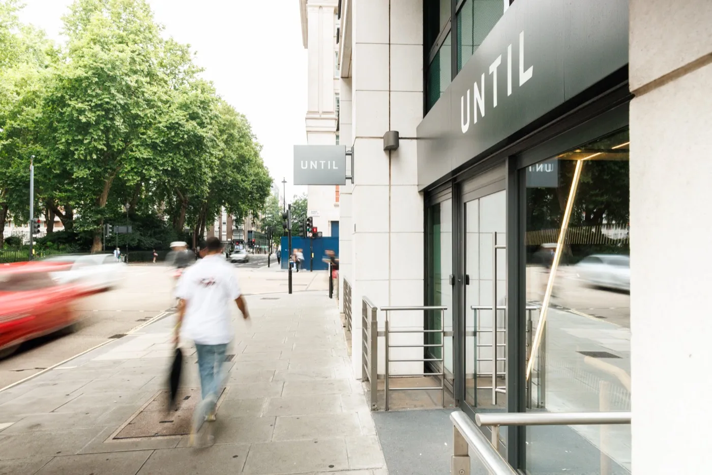 The UNTIL Marylebone entrance and street signage seen from the pavement