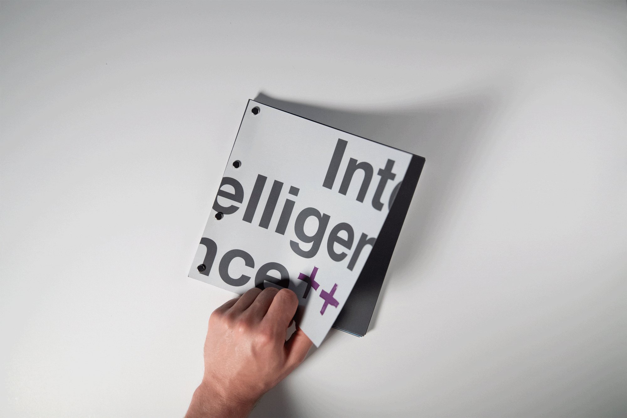 Poster of in-progress brand assets with sticky note annotations