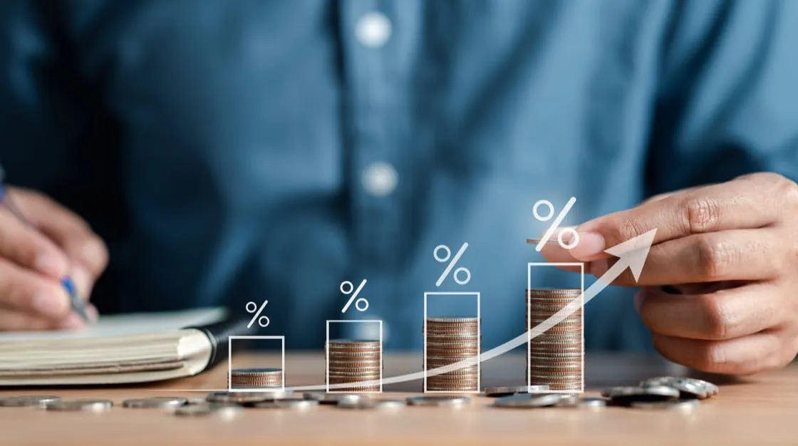 stacked coins growing into chart
