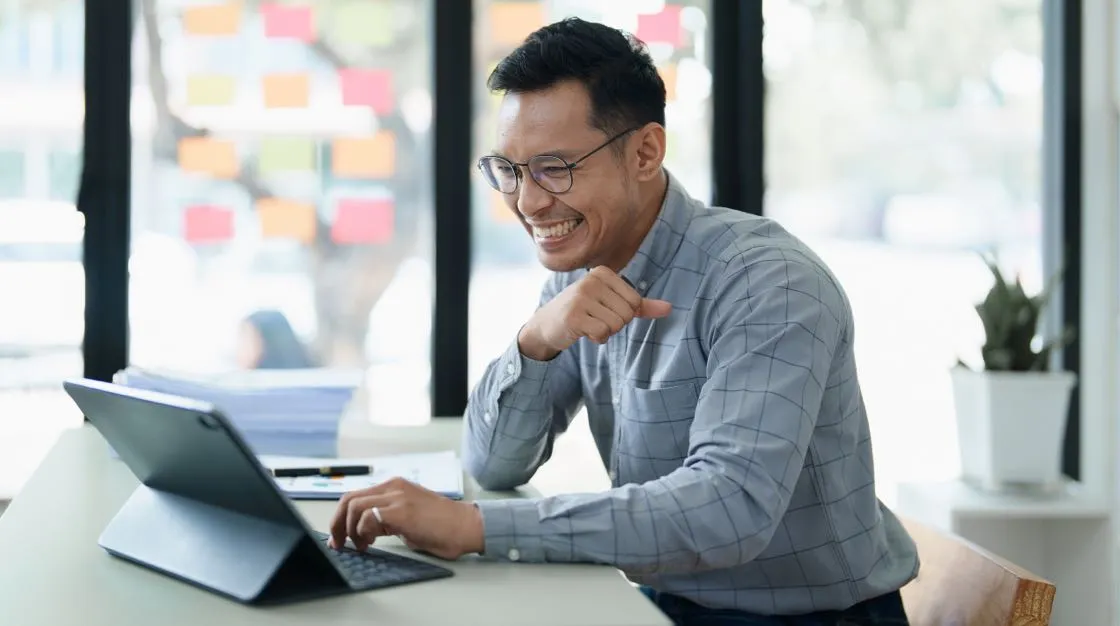 business owner looking at tablet