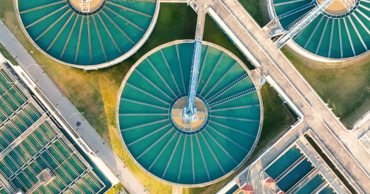 Advanced drone in operation, water treatment plant aerial view inspection.