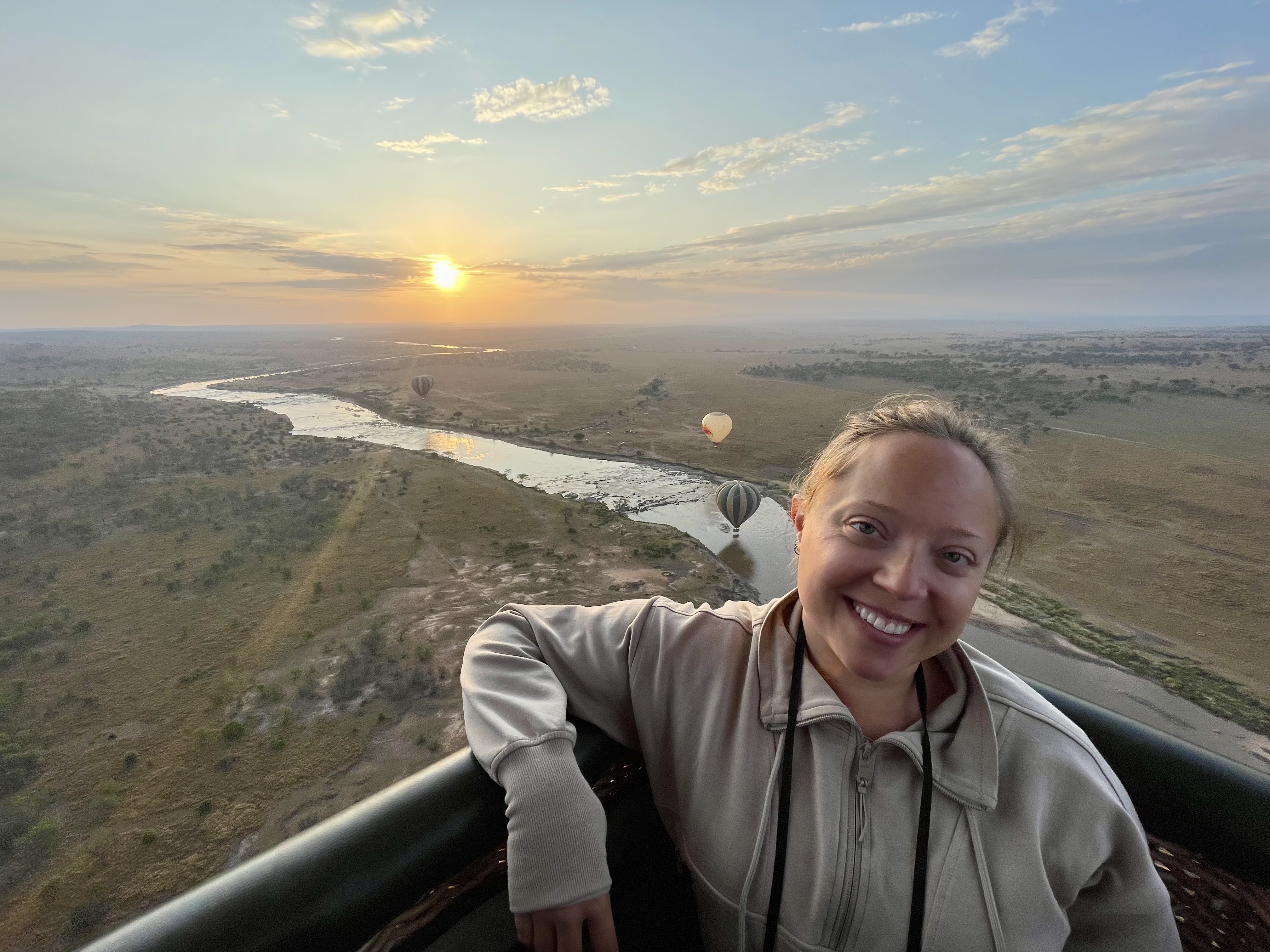 Me in a hot air balloon floating over Serengeti National Park