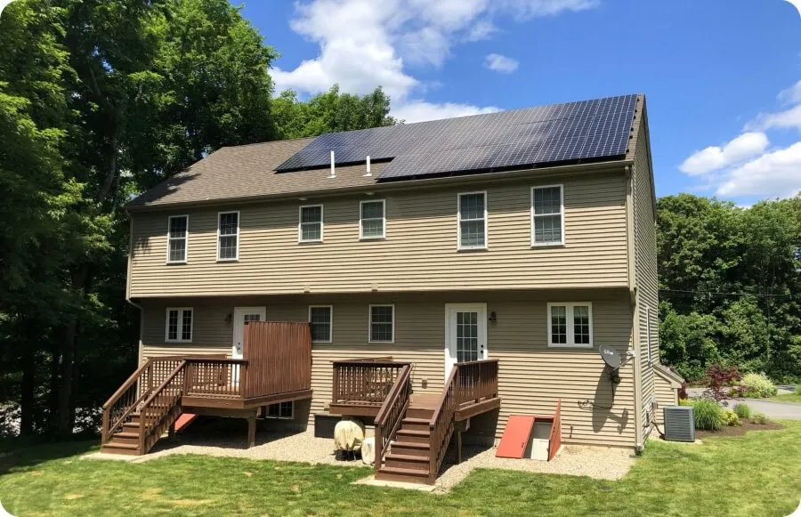Rooftop solar panel array installed on a two-story house
