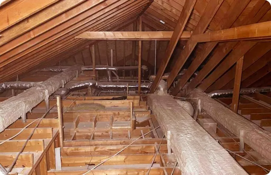 Attic duct sealing with sealed joints on insulated HVAC ducts