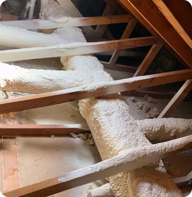 Attic duct sealing with closed-cell spray foam around HVAC trunks and lines