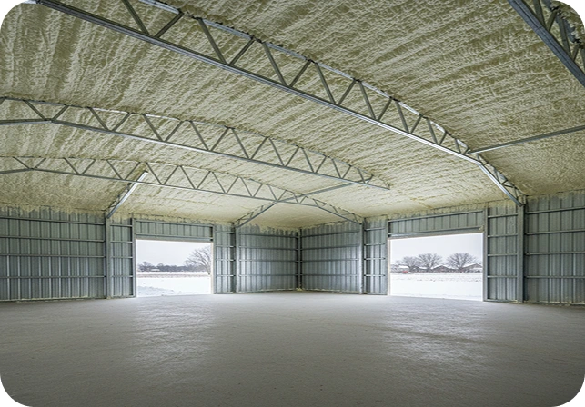 Spray foam insulation applied to metal building roof