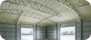 Spray-foamed commercial metal building roof