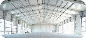 White vinyl liner system under roof purlins