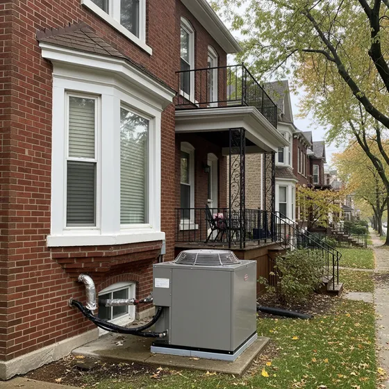 Outdoor AC unit installed beside a Chicago home