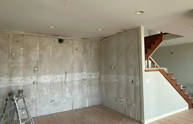 Bare interior wall prepared for installing soundproof insulation