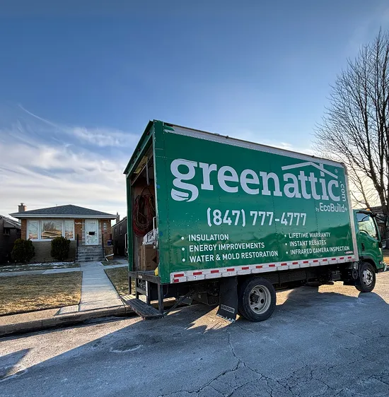 Green Attic service truck parked in front of a home for healthy attic insulation and rodent prevention services