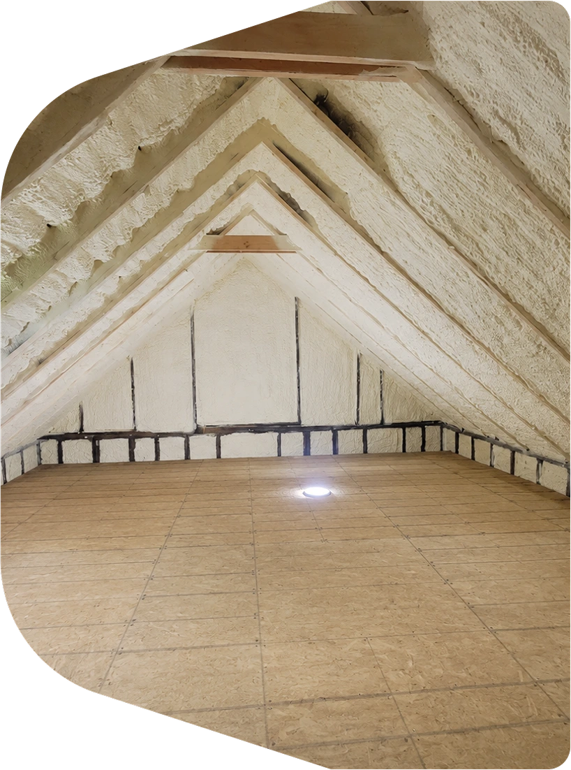 Spray foam roof insulation installed along the attic roof deck