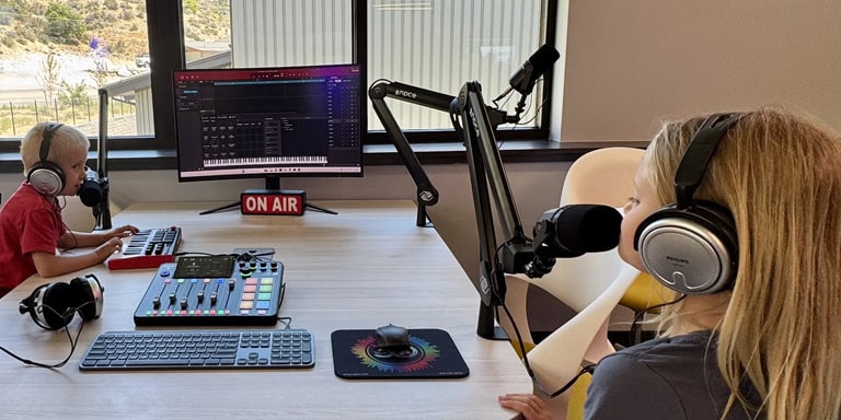 Youth testing podcast station