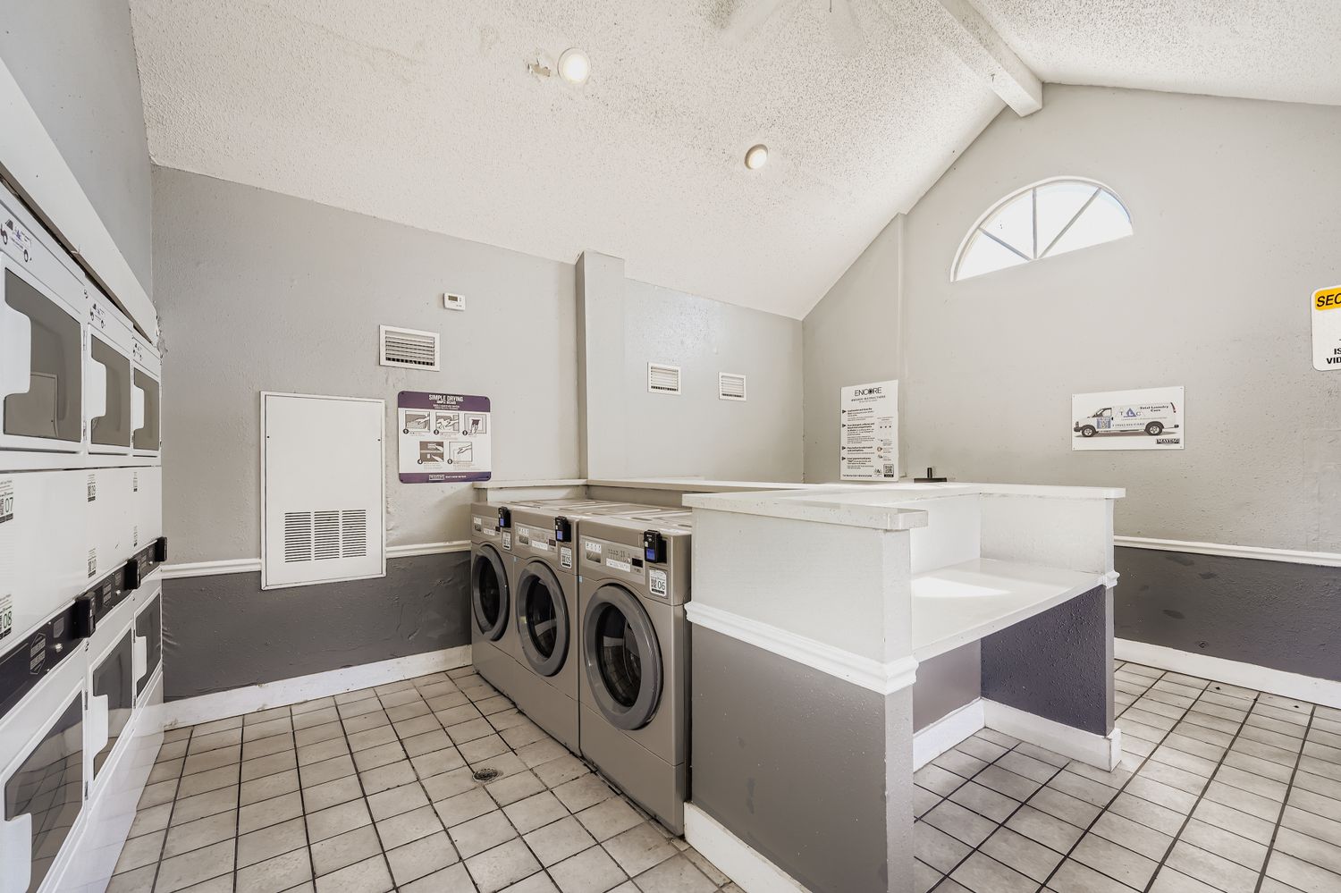 laundry room with washing and drying machines