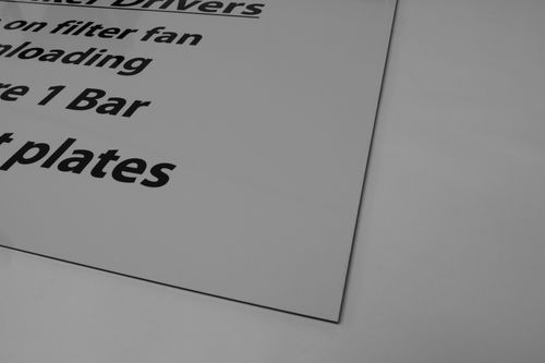 Corner of a sign printed onto aluminium composite material for use outdoors