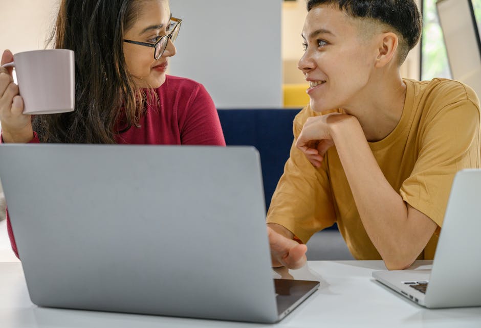 An engaging office setting where two representatives are having a friendly phone conversation, emphasizing connection over business.