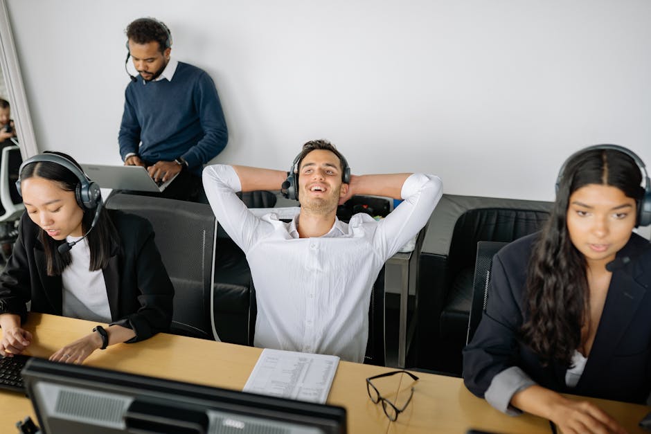 A collaborative office scene showing a diverse team using AI technology while engaging with clients, showcasing brand integration.