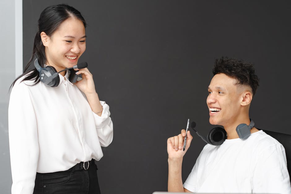 A diverse team of customer service representatives engaged in a professional and friendly conversation over the phone, showcasing effective communication.