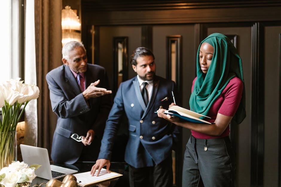 A team listening to recorded phone calls, taking notes, and discussing strategies for improvement.