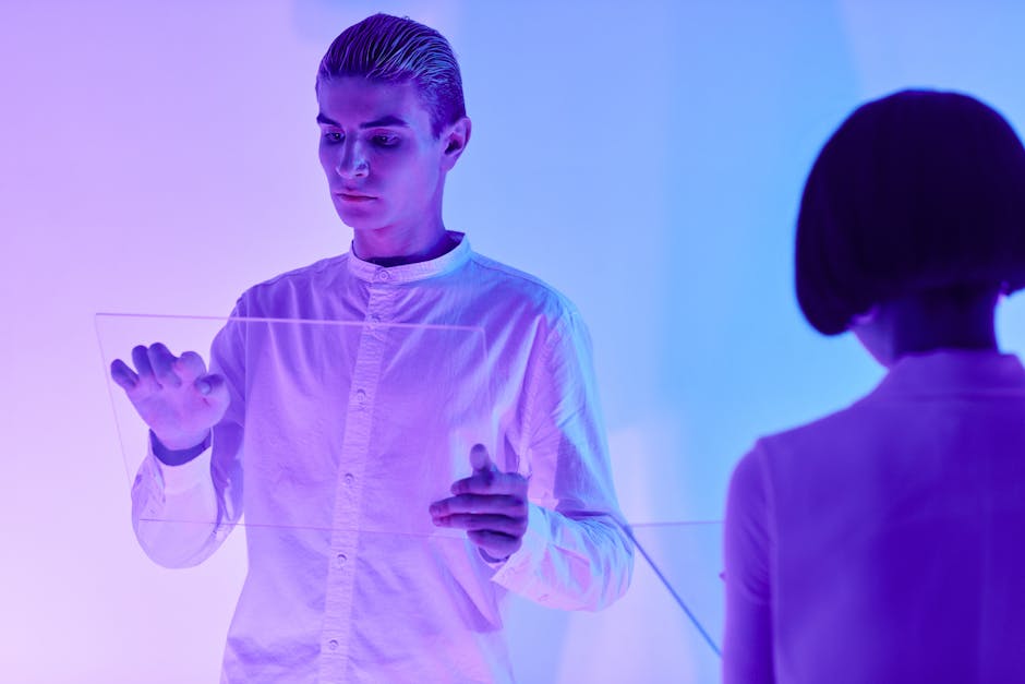 A business team excitedly welcoming clients with the help of a digital virtual receptionist on large screens, emphasizing technological advancement.