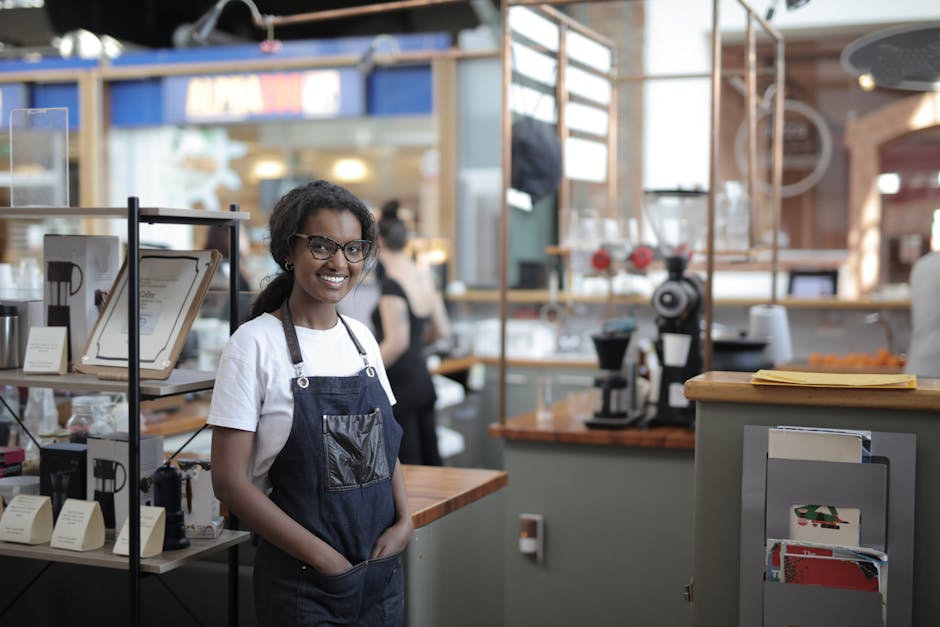 A creative image depicting a business owner joyfully celebrating after successfully acquiring a memorable phone number, surrounded by satisfied customers.