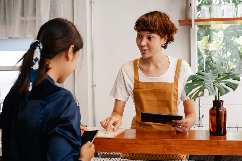 An engaging image showing a friendly employee answering the phone, showcasing a warm and professional demeanor.