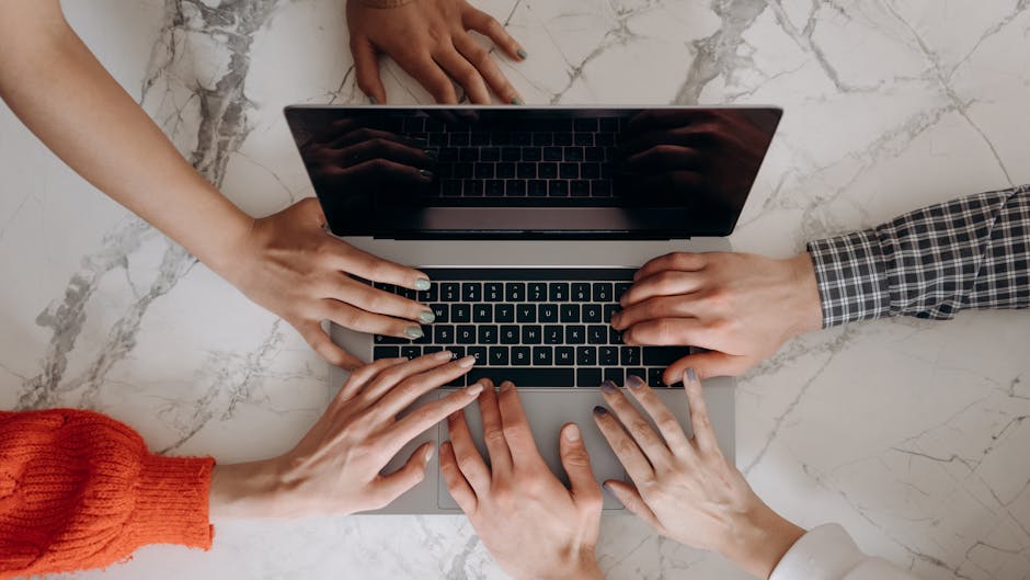 An illustration of a modern office with team members collaborating over a digital transcribing tool, highlighting teamwork and efficiency.